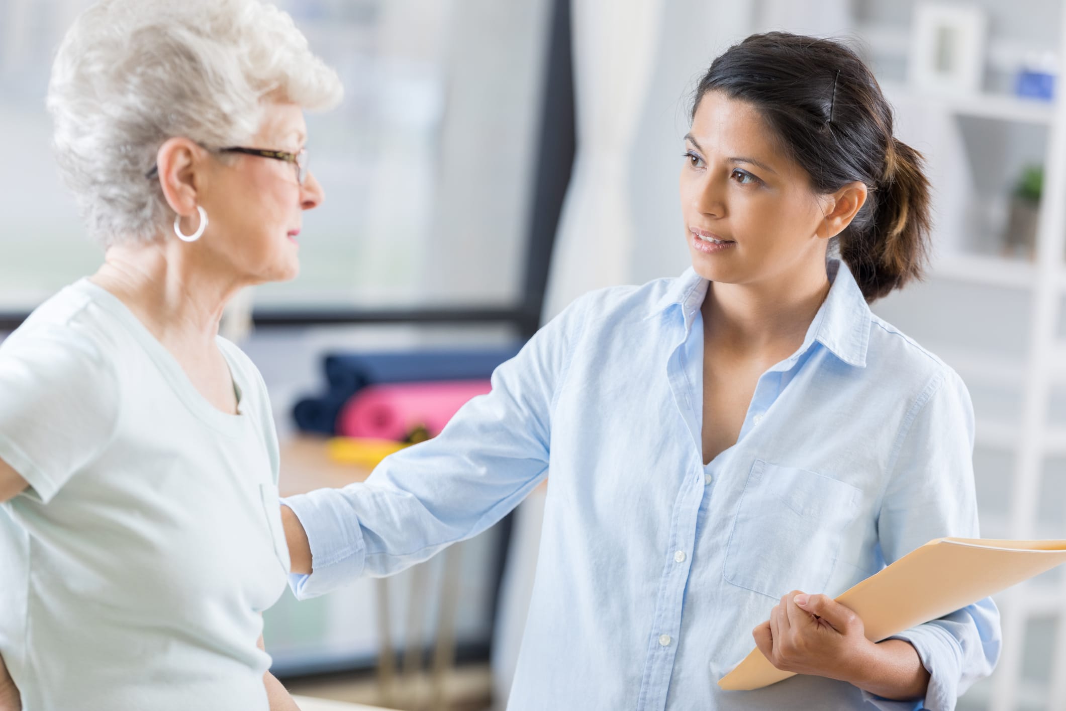 nurse speaking with a women